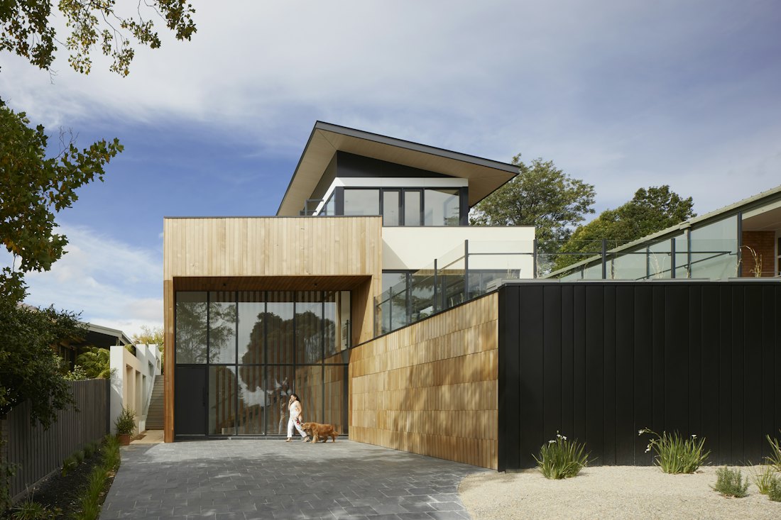 Ordinary lived-in cottage-style home with a front garden